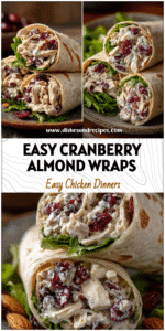 Wraps filled with creamy cranberry almond chicken salad and crisp greens on a rustic plate.